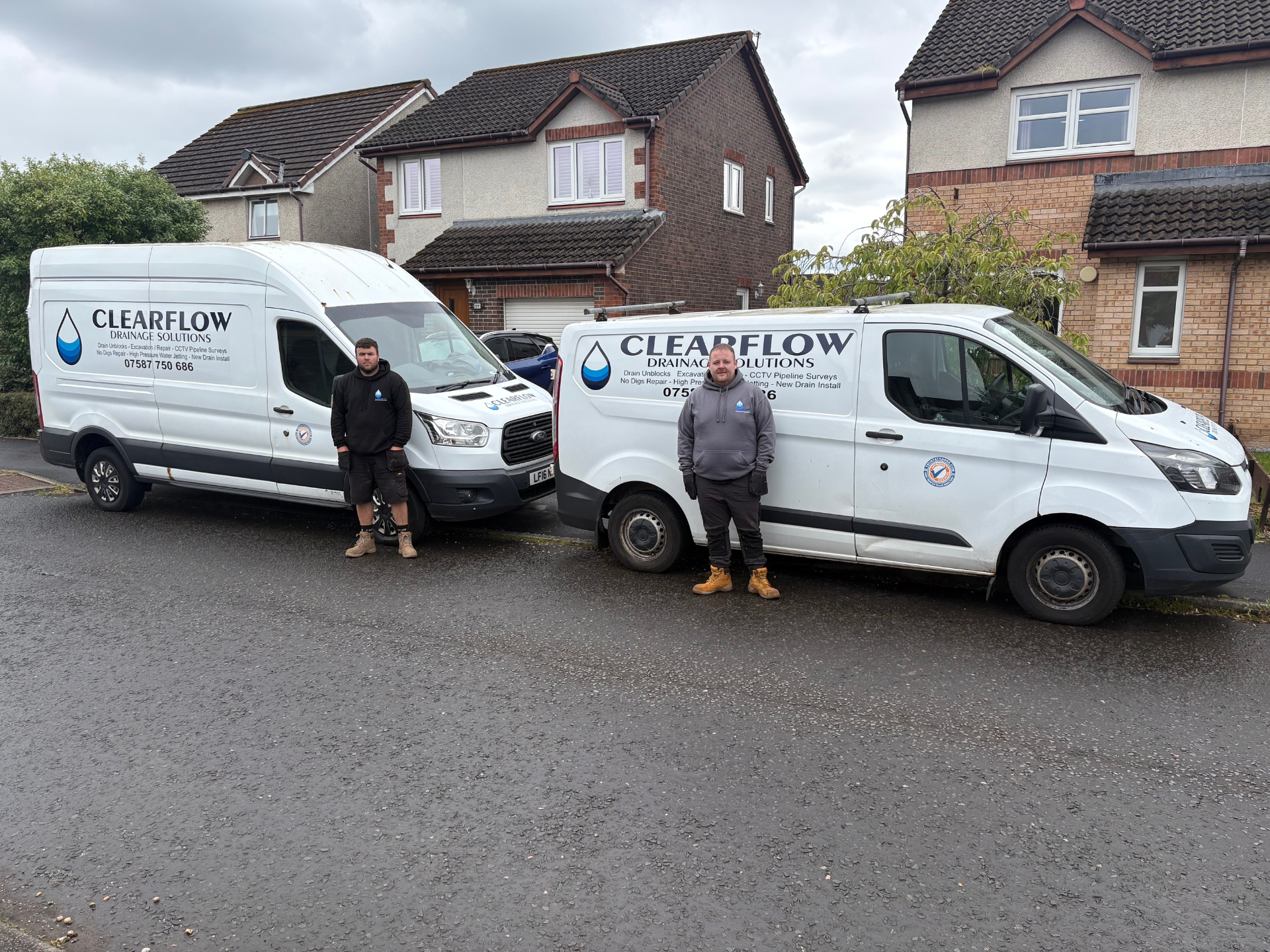 ClearFlow vans parked on a Glasgow street ready for jobs