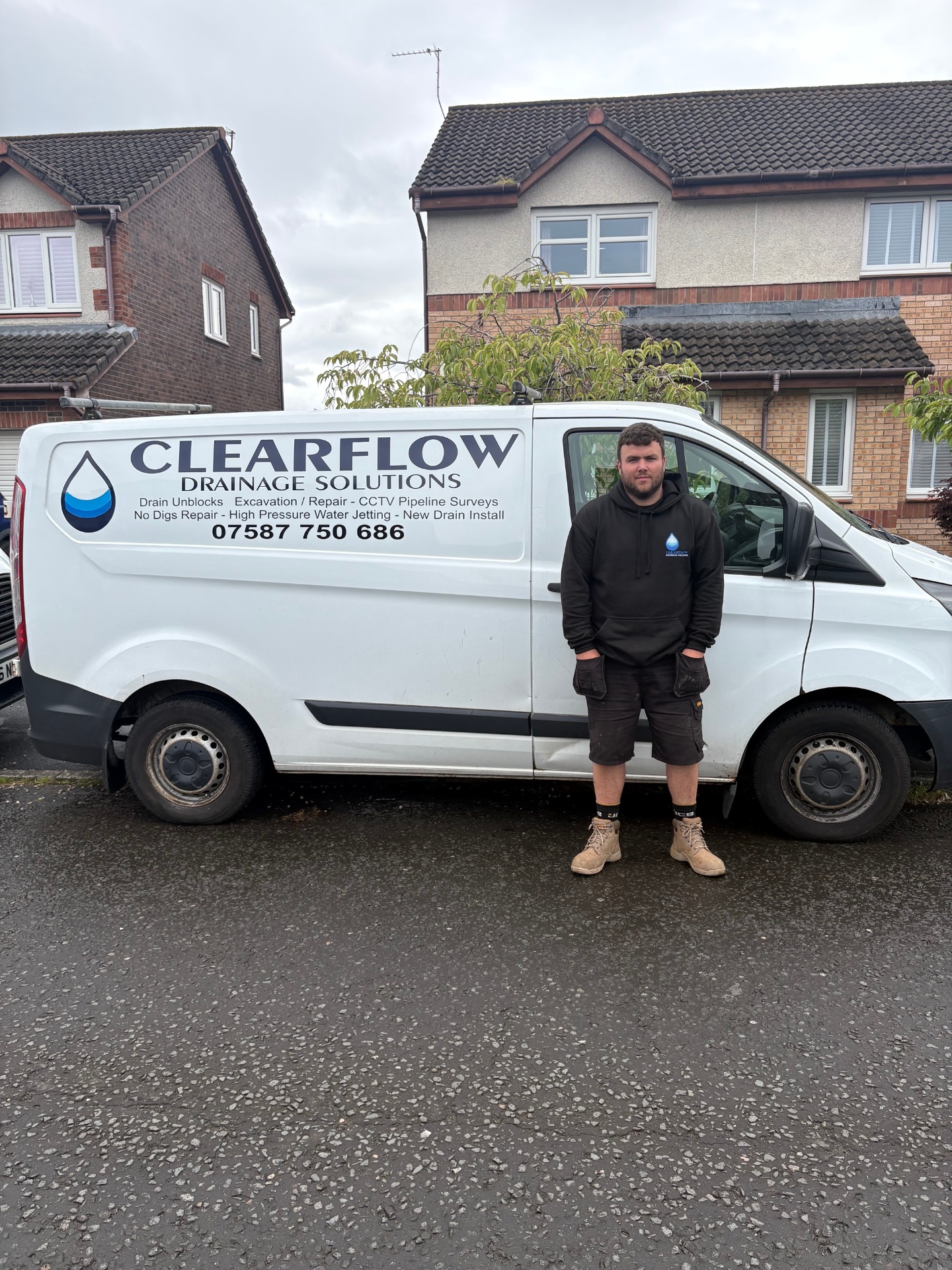 ClearFlow engineer with the company van on a Glasgow callout