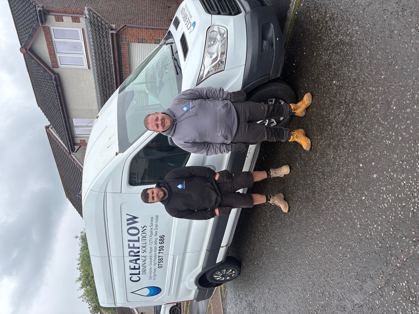 David and Chris standing beside the ClearFlow Drainage Solutions van