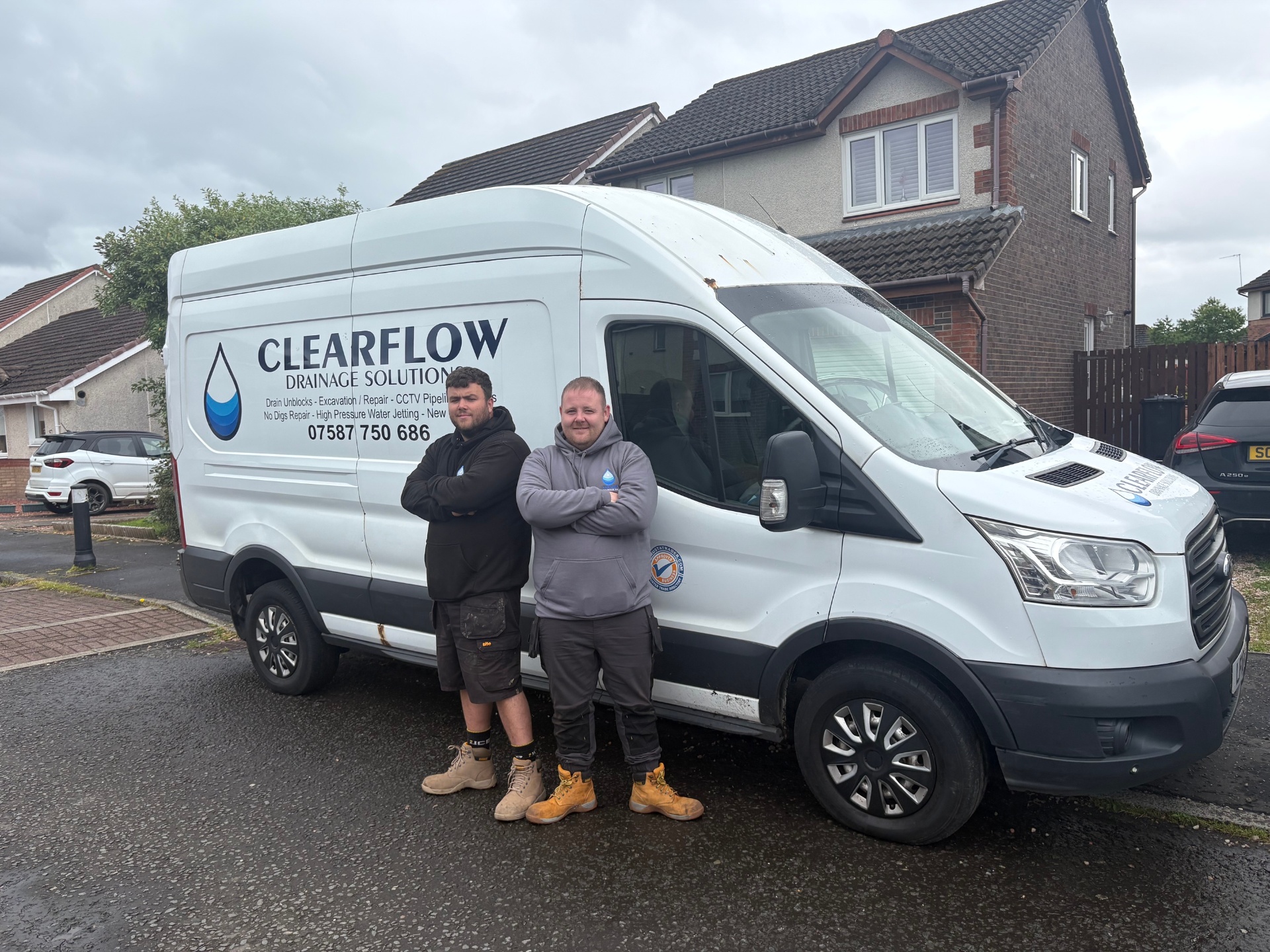 David and Chris of ClearFlow Drainage Solutions with the company van in Glasgow